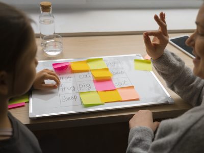 high-angle-woman-girl-playing-memory-game