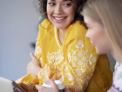 young-women-wearing-embroidered-shirts